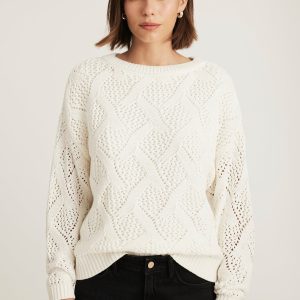 CABLE-KNIT SWEATER IN ANTIQUE WHITE